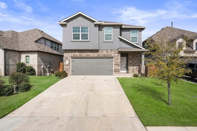 view of front of property featuring brick siding, stucco siding, a garage, driveway, and a front lawn