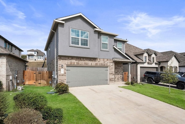 view of front of property with driveway, stucco siding, a front yard, and brick siding