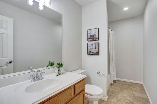 full bathroom with vanity, toilet, and shower / tub combo