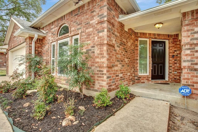 property entrance featuring a garage