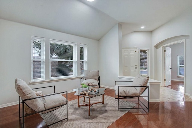 sitting room featuring vaulted ceiling and light hardwood / wood-style floors