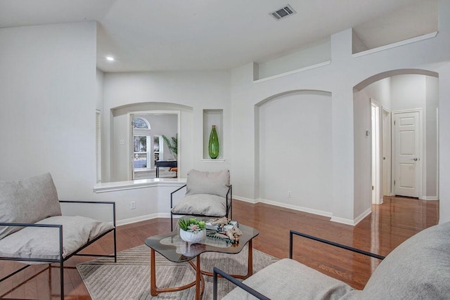 sitting room featuring hardwood / wood-style floors