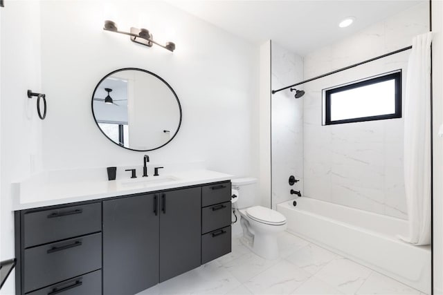 full bathroom with vanity, toilet, and tiled shower / bath combo