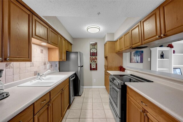 307 Poker Chip Unit 116, Horseshoe Bay, TX 78657 - kitchen with stainless steel range with electric stovetop, a textured ceiling, tasteful backsplash, light countertops, and dishwashing machine