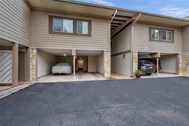 307 Poker Chip Unit 116, Horseshoe Bay, TX 78657 - view of front of property with stone siding