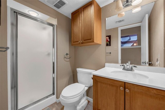 307 Poker Chip Unit 116, Horseshoe Bay, TX 78657 - bathroom with a stall shower, vanity, and tile patterned floors