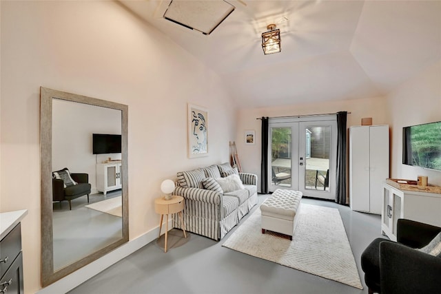 living room with french doors, concrete flooring, and vaulted ceiling