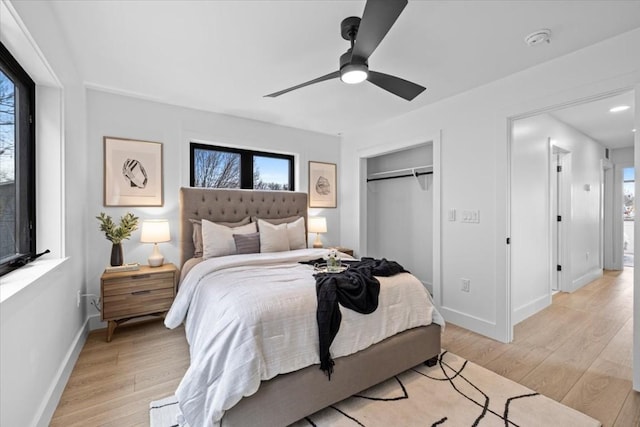 4709 Depew Ave Unit B, Austin, TX 78751 - bedroom featuring multiple windows, a closet, and light wood-style flooring
