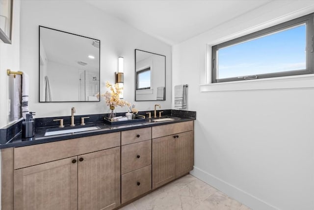 4709 Depew Ave Unit B, Austin, TX 78751 - full bath featuring marble look tile flooring and double vanity