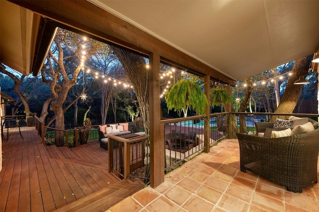 view of patio with a pool side deck and outdoor lounge area