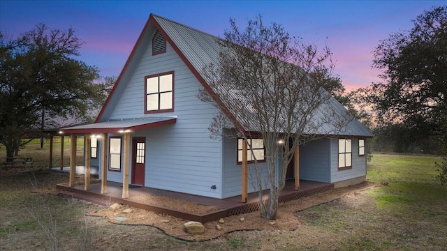 view of front of house with a lawn