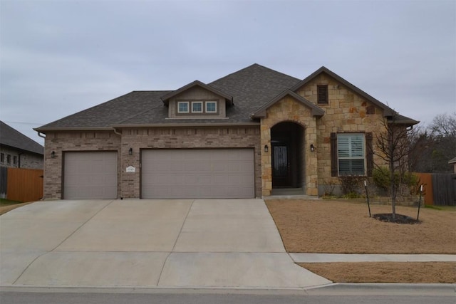 view of front of property featuring a garage