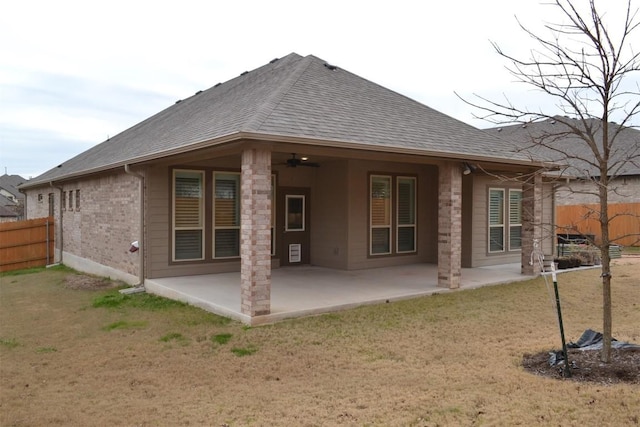 back of house with a patio, a yard, and ceiling fan