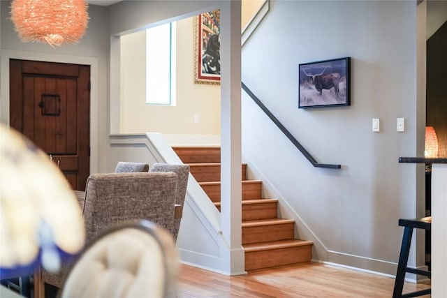 stairway with wood-type flooring