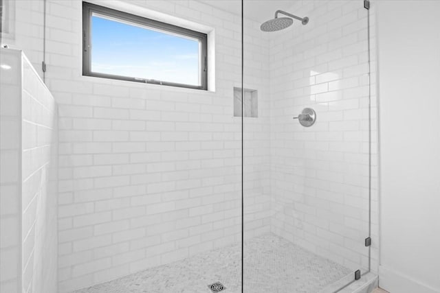 bathroom with walk in shower