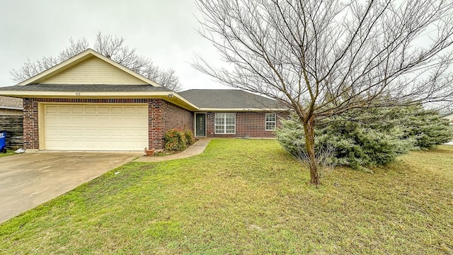 ranch-style house with a garage and a front lawn