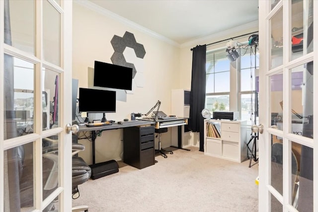 office area featuring light carpet, ornamental molding, and french doors