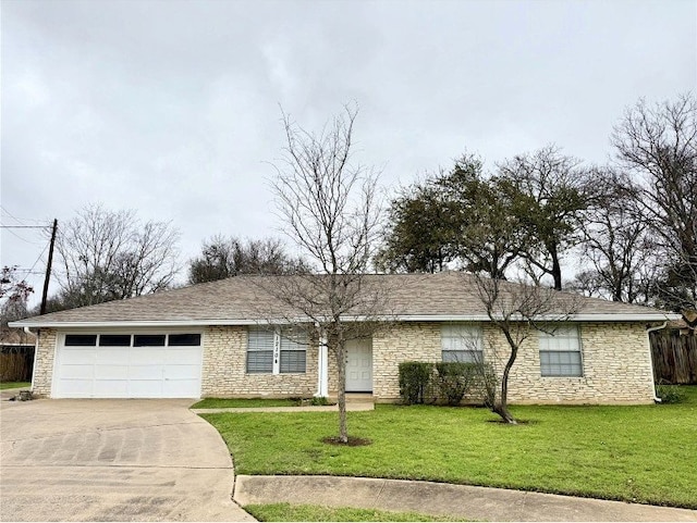 12104 Sage Hen Cir, Austin, TX 78727 - single story home featuring stone siding, concrete driveway, a garage, and a front lawn