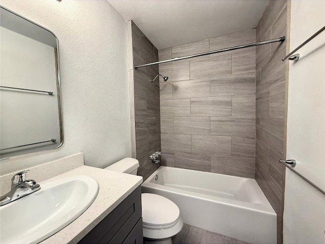 12104 Sage Hen Cir, Austin, TX 78727 - bathroom featuring vanity, shower / tub combination, and a textured wall
