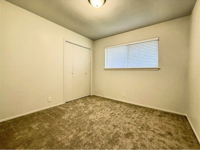 12104 Sage Hen Cir, Austin, TX 78727 - unfurnished bedroom with carpet floors and a closet