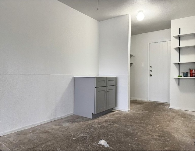 12104 Sage Hen Cir, Austin, TX 78727 - spare room featuring concrete floors