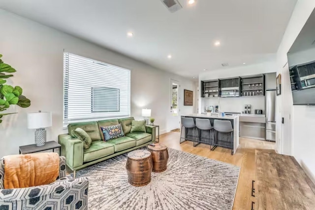 living room featuring light hardwood / wood-style floors