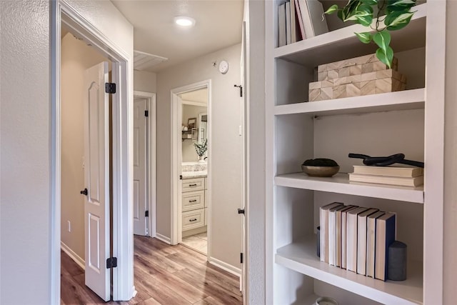 hall featuring hardwood / wood-style floors