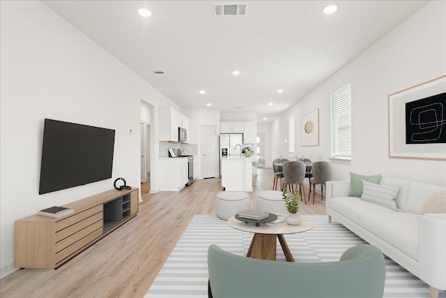 living room featuring light hardwood / wood-style floors