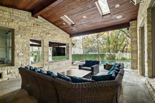 view of patio / terrace featuring an outdoor hangout area and a fenced in pool