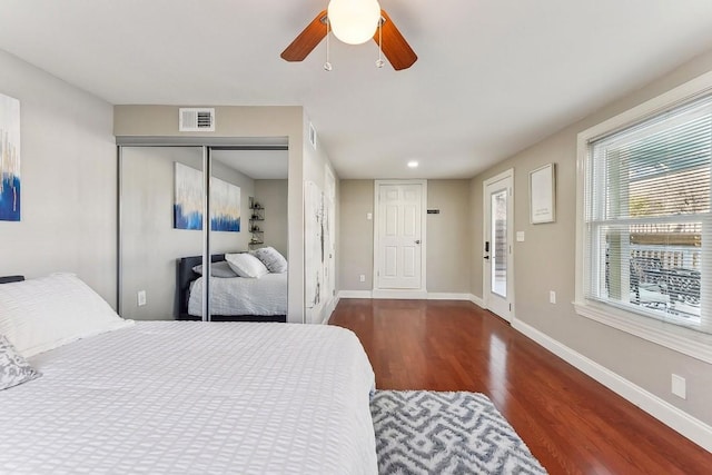 906 E 43rd St, Austin, TX 78751 - bedroom featuring wood finished floors, a closet, and a ceiling fan