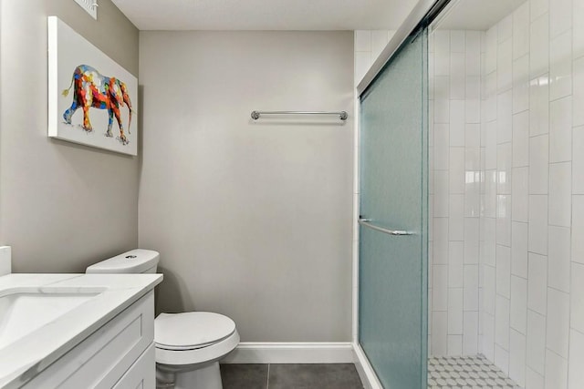 906 E 43rd St, Austin, TX 78751 - full bathroom featuring a shower stall, tile patterned floors, and vanity