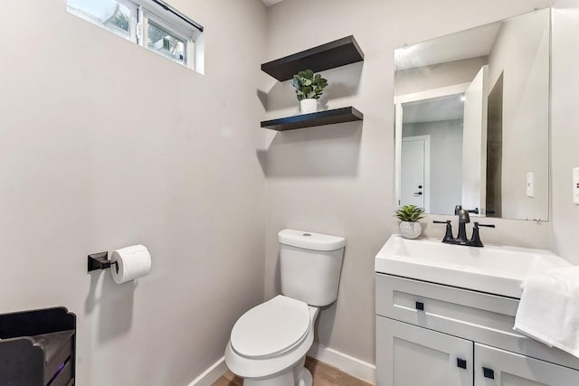 906 E 43rd St, Austin, TX 78751 - half bath featuring vanity and wood finished floors