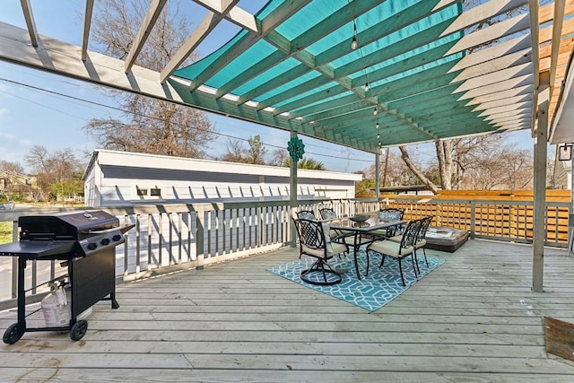 906 E 43rd St, Austin, TX 78751 - deck featuring area for grilling, outdoor dining area, and a pergola