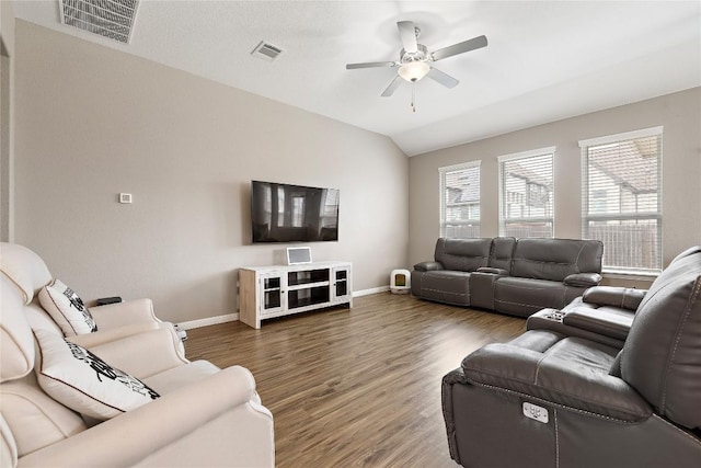 living room with lofted ceiling, dark hardwood / wood-style floors, and ceiling fan