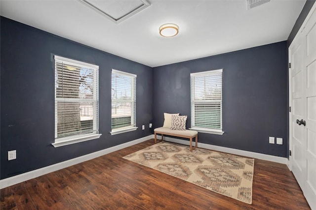 1191 Chicon St, Austin, TX 78702 - sitting room with wood finished floors and attic access