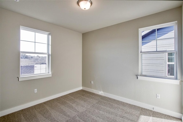 5812 Rotunda Vw, Austin, TX 78747 - carpeted empty room with baseboards