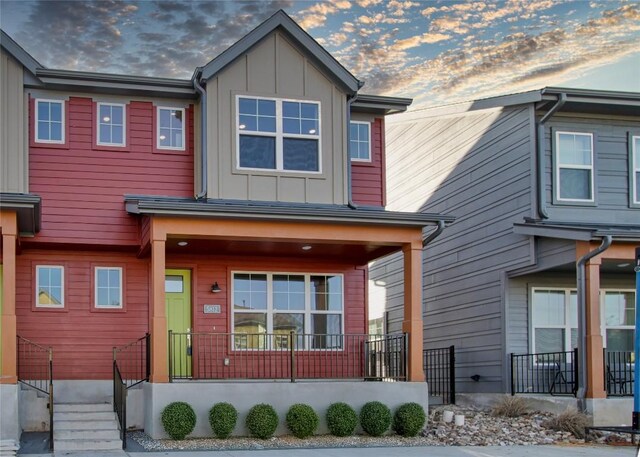 5812 Rotunda Vw, Austin, TX 78747 - view of front of home featuring board and batten siding and a porch