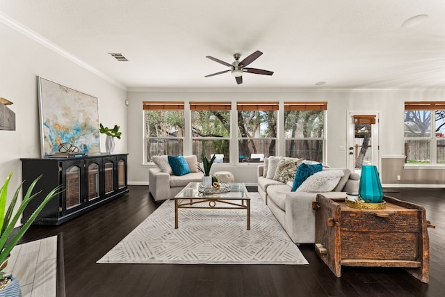 living room featuring ornamental molding, dark hardwood / wood-style floors, and ceiling fan