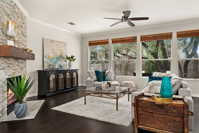 3305 Avenal Dr, Austin, TX 78738 - living area with ceiling fan, a fireplace, wood-type flooring, and crown molding