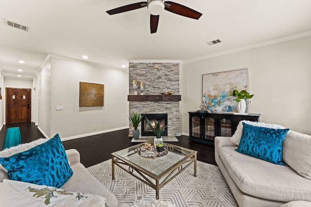 3305 Avenal Dr, Austin, TX 78738 - living room with wood finished floors, crown molding, a ceiling fan, recessed lighting, and a stone fireplace