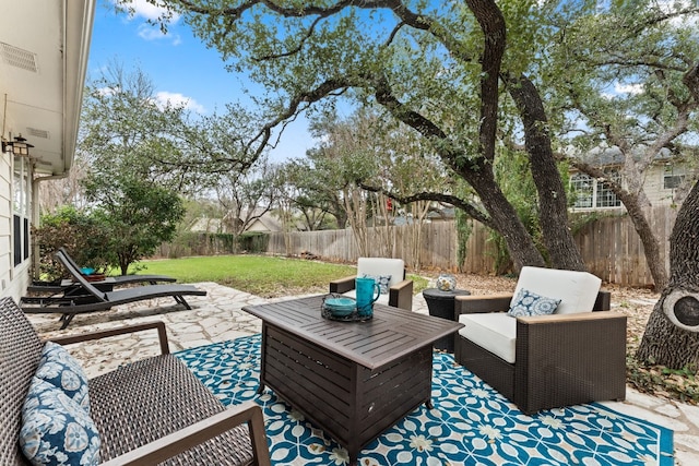 3305 Avenal Dr, Austin, TX 78738 - fenced backyard with a patio and outdoor lounge area