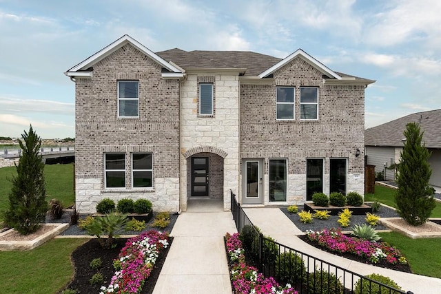 view of front facade with a front lawn