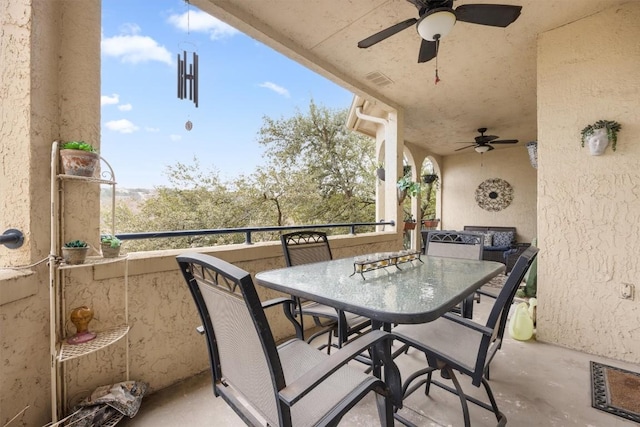 exterior space featuring ceiling fan, visible vents, outdoor dining area, and a balcony