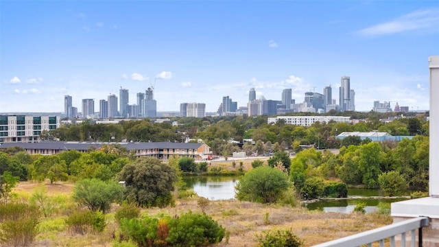 property's view of city featuring a water view