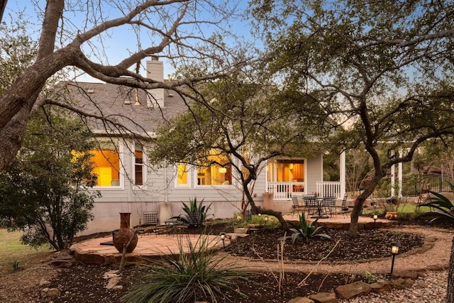 rear view of property with a patio area