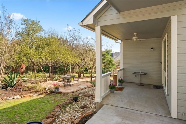 view of patio featuring ceiling fan