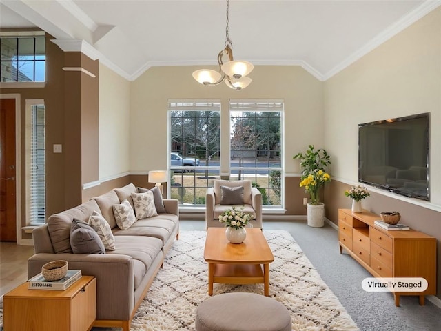 carpeted living room with ornamental molding, lofted ceiling, and an inviting chandelier