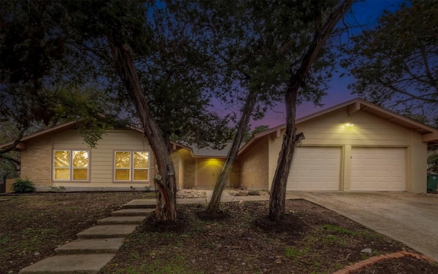 single story home featuring a garage