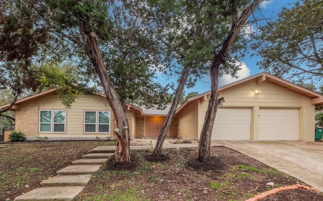 single story home with a garage