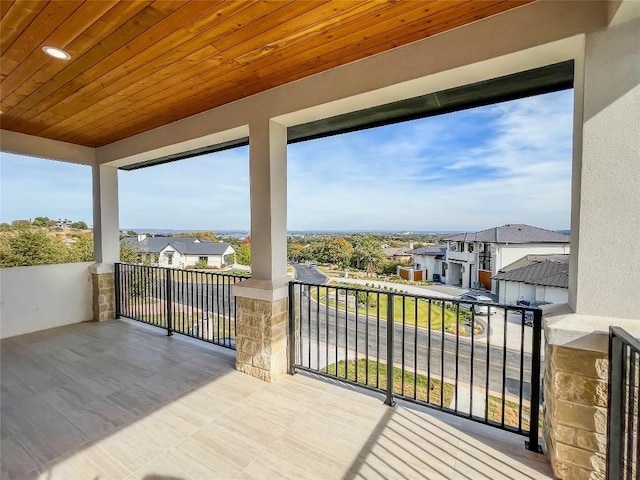 exterior space with wood ceiling